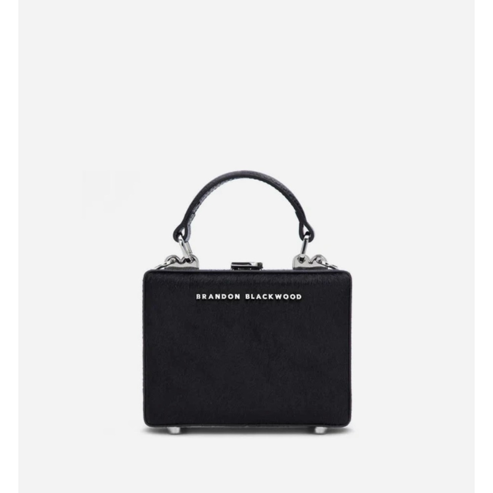 Brandon Blackwood calf hair mini trunk purse